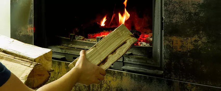 Wood Stove Heat Resistant Wall Repair in Red Deer, Alberta